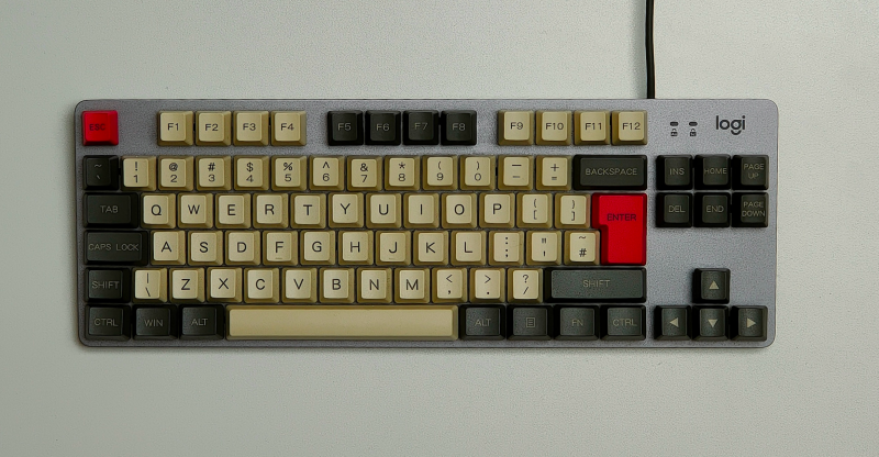 Red, cream, and black keycaps