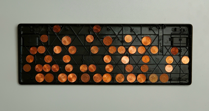 Coins glued to the keyboard case